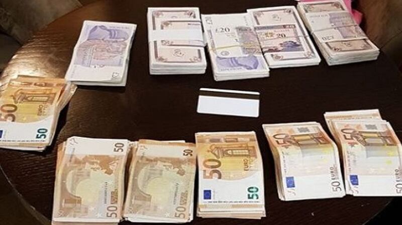 Cash seized by gardaí during raids in Co Wicklow on Wednesday. Photograph: An Garda Síochána