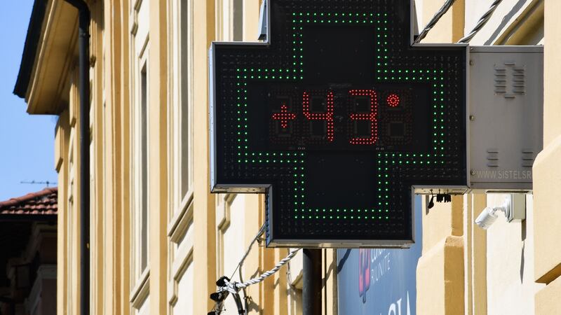 Temperature recorded in  Reggio Emilia, near Bologna in northern Italy. Photograph:  Miguel Medina/AFP