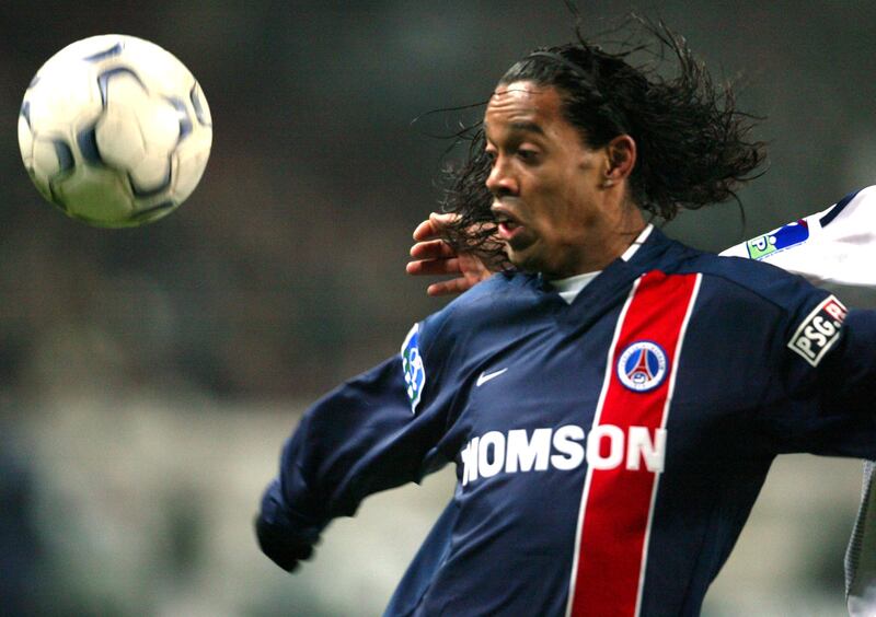 Ronaldinho in action for PSG against Bordeaux in 2002. Photograph: Martin Bureau/AFP/Getty 