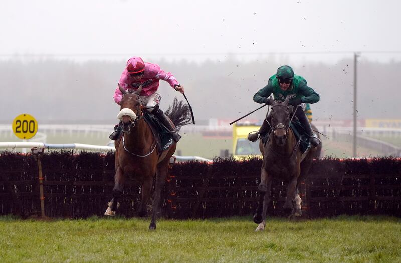 Brewin'upastorm (left) ridden by jockey Jack Kennedy on their way to winning the Rathbarry & Glenview Studs Hurdle at Fairyhouse. Photograph: Niall Carson/PA Wire