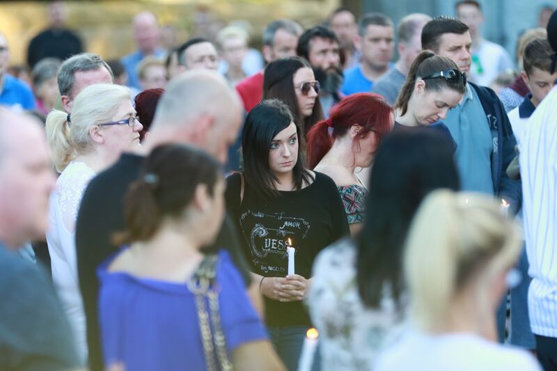 People attend a vigil for Cameron Reilly after he was found dead in 2018. Photograph: Nick Bradshaw