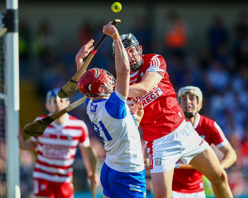 Waterford’s Patrick Fitzgerald and Cork’s Ger Mellerick in their Munster  senior championship match. Photograph: Ken Sutton/Inpho