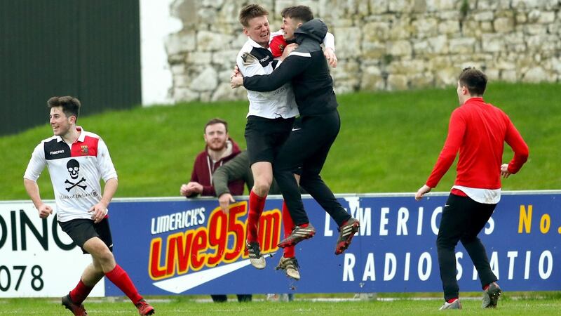 UCC players celebrate their  Collingwood Cup success over University of Limerick in the final at the  Markets Field. Photograph: James Crombie/Inpho