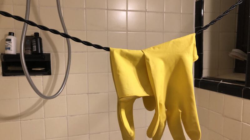 Glovely: my bright yellow dishwasher gloves worn in a recent strategy to combine hygiene with reuse