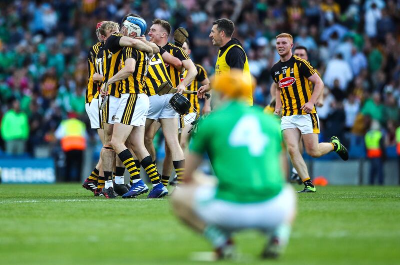 Kilkenny's TJ Reid celebrates winning with teammates. Photograph: James Crombie/Inpho