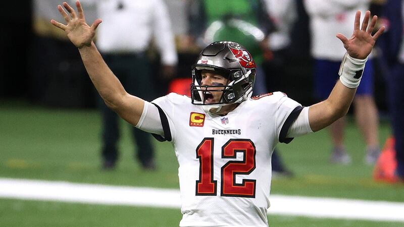 Tom Brady celebrates a first down against the New Orleans Saints late in the fourth quarter in the NFC Divisional playoff game. Photograph: Chris Graythen/Getty Images