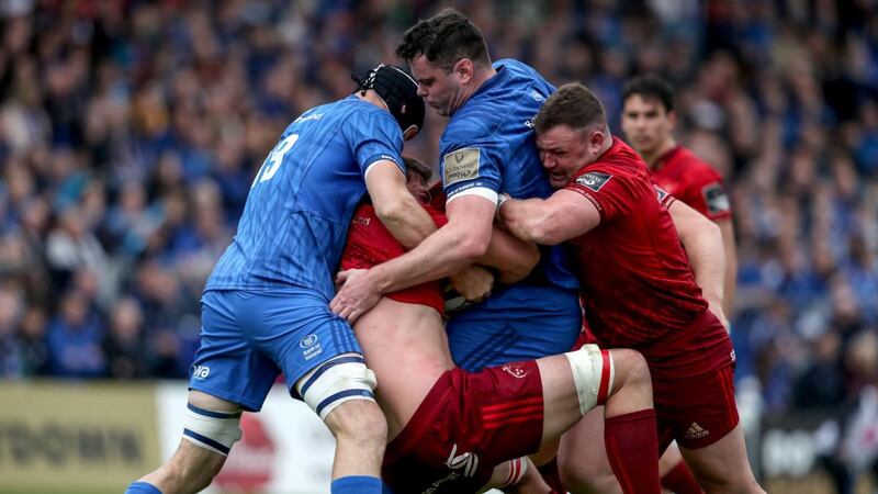 Munster’s CJ Stander  is wrapped up by  Leinster’s Scott Fardy and James Ryan as Dave Kilcoyne assists his team-mate during the Guinness Pro 14 semi-final at the  RDS. Photograph:  Dan Sheridan/Inpho