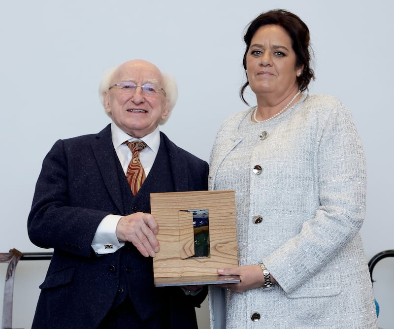 President Michael D Higgins with Mary Ellen McGroarty after she received the 2022 Peace, Reconciliation and Development Award at Áras an Uachtaráin. Photograph: Maxwells Dublin