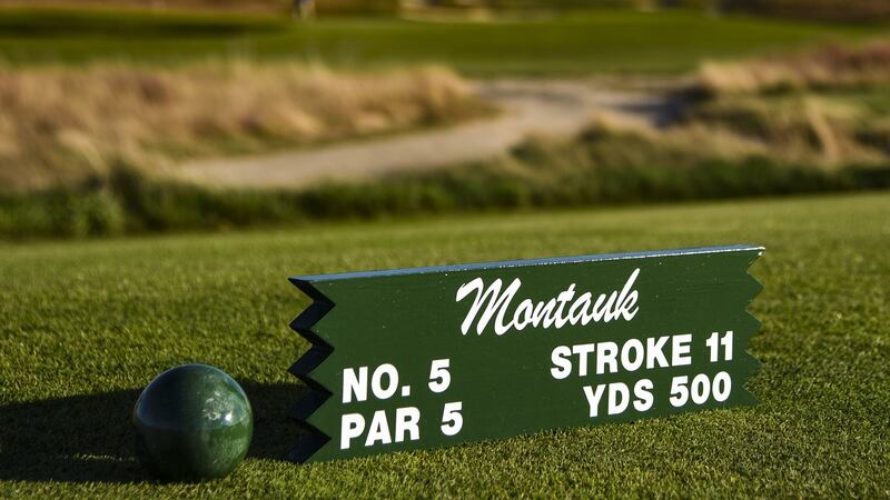 A tee marker for the Par 5 fifth hole ‘Montauk’ sits on display during media day for the 2018 US Open Championship at Shinnecock Hills Golf Club on October 4th, 2017, in Southampton, New York. Photograph:  Keyur Khamar/PGA Tour