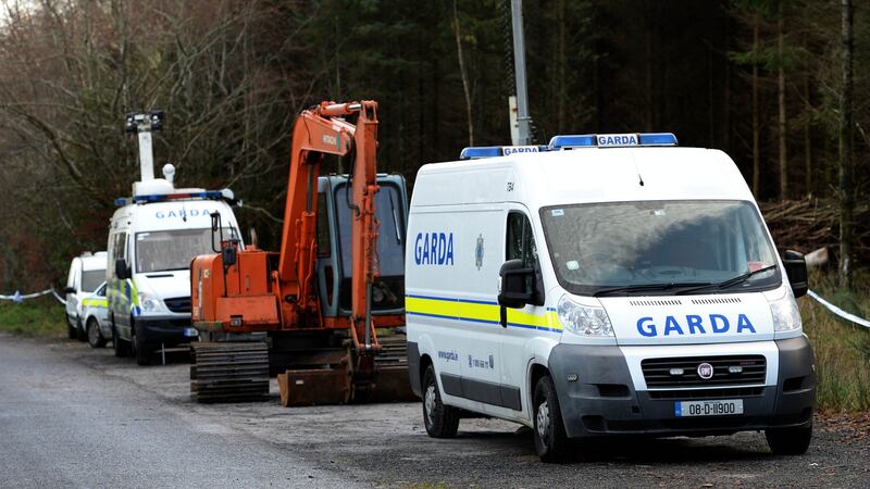 Gardaí search for the remains of  Fiona Pender, having cleared a strip of woodland at the edge of a remote forest in the Slieve Bloom mountains in Co Laois, December 2014. File photograph: Eric Luke/The Irish Times