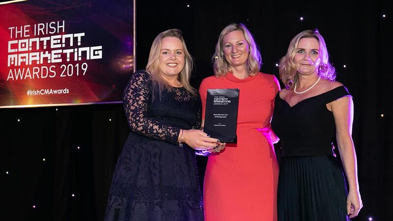 Lorraine Griffin, Awards Judge presents the Most Effective Use of Photography award to Ellen O'Donovan & Emma Henry, Centra.