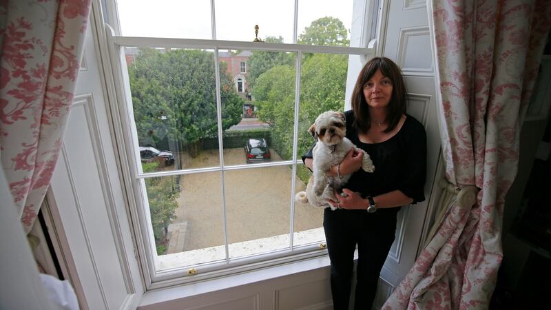 Maggie O’Neill, who fears part of the front garden of her home, on Terenure Road East, may be subject to a compulsory purchase order as part of the BusConnects project. Photograph Nick Bradshaw