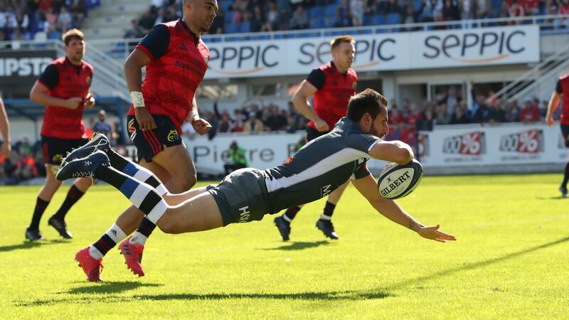 Julien Dumora crosses for Castres during their opening Champions Cup draw with Munster. Photograph: Billy Stickland/Inpho