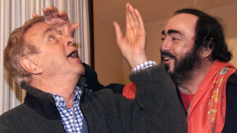 Italian tenor Luciano Pavarotti jokes with director Franco Zeffirelli in Rome in 2000. File photograph: Gabriel Bouys/AFP/Getty Images