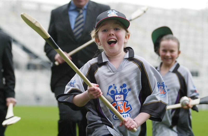 Aoife Wade (8) with Aisling Bergin (9), both from Santry, Dublin, at the launch of VHI Cúl Camps in Croke Park in 2005. Photograph: Fran Veale