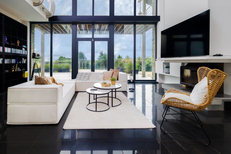 Living area opens on to a paved terrace. Photograph: James Osborne