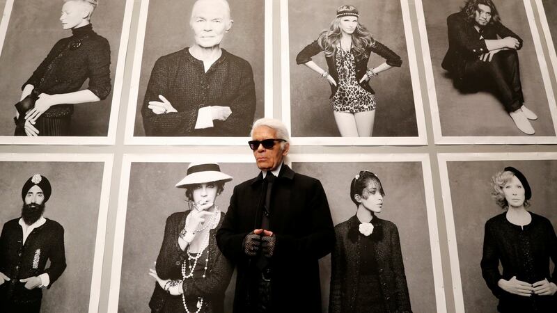 Karl Lagerfeld poses before the opening of his photo exhibition entitled “Little Black Jacket” at the Grand Palais in Paris in 2012. File Photograph:Benoit Tessier/Reuters