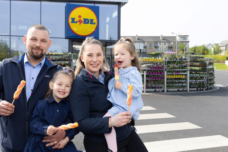 The Ungureanu family outside the Greystones store