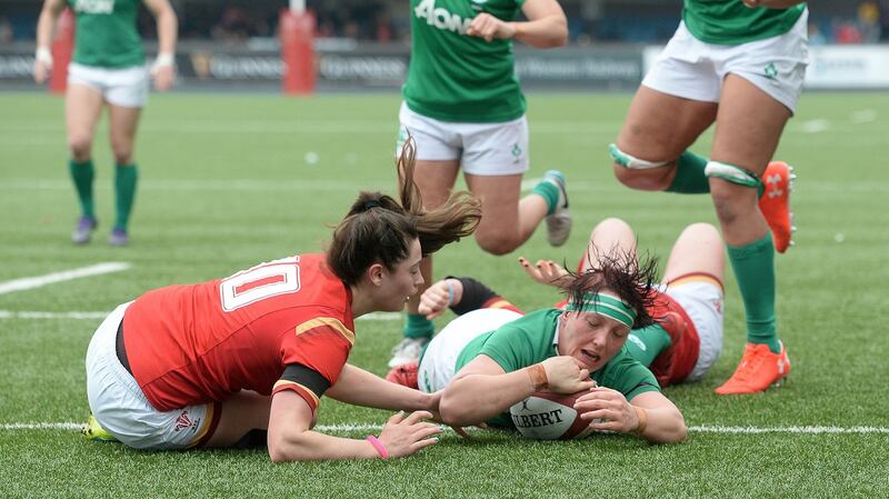 Lindsay Peat scores a try for Ireland against Wales at the Cardiff Arms Park during this year’s  Women’s Six Nations. Photograph: Ian Cook/Inpho