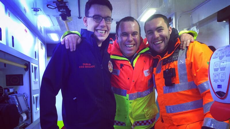 Ros Mac Cobb, centre, his brother Cathal (left) are both working with Dublin Fire Brigade on Christmas Day. Their brother Donnchadh (right) will be on call for the Irish Coast Guard.