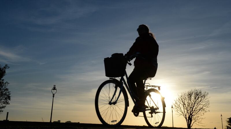 A cyclist returning home  along the cycle path at Clontarf, Dublin. Photograph; Dara Mac Dónaill