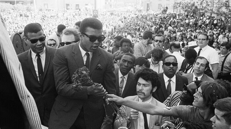 Former world heavyweight champion Muhammad Ali greets a fan in 1968. File photograph: Getty Images