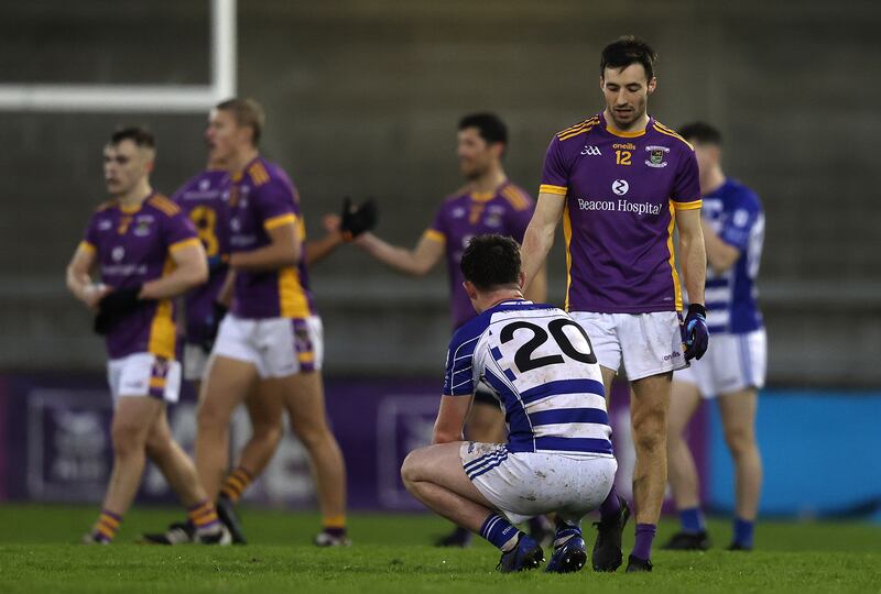 Naas's Alex Beirne and Aidan Jones of Kilmacud Crokes after last year's SFC quarter-final. Photograph: Bryan Keane/Inpho