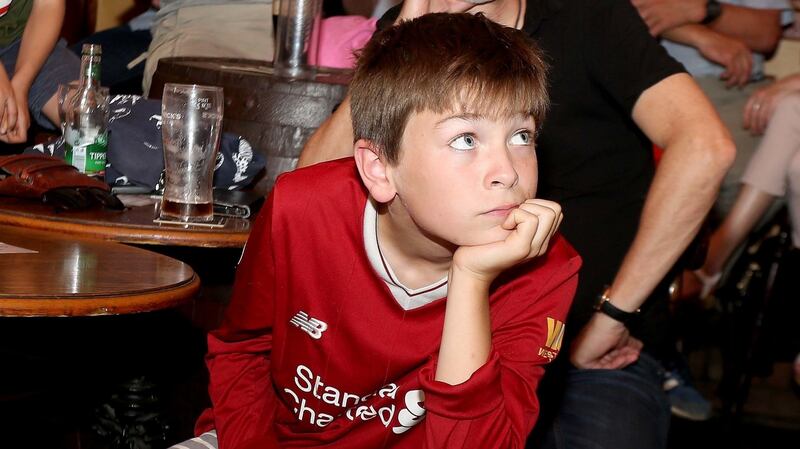 Thomas Hodgins-Byrne reacts as fans watch the FIFA World Cup quarter final between Sweden and England at Molly’s Bar in Letterfrack, Galway. Photograph: Hany Marzouk/PA Wire