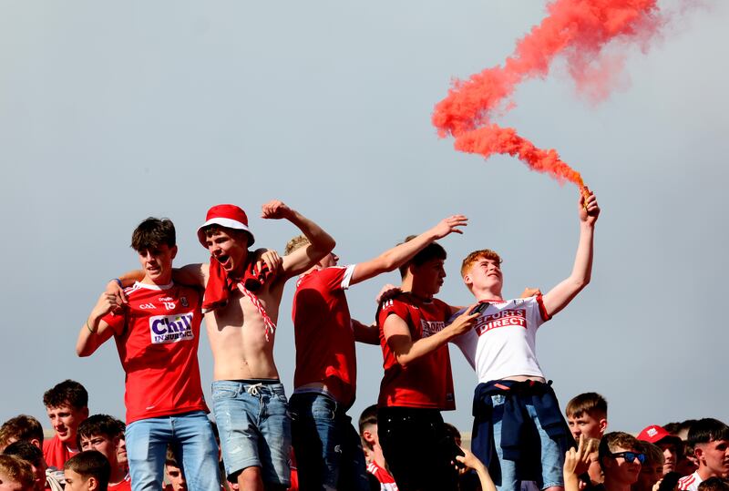 Cork fans celebrate after victory at Croke Park. Photograph: James Crombie/Inpho
