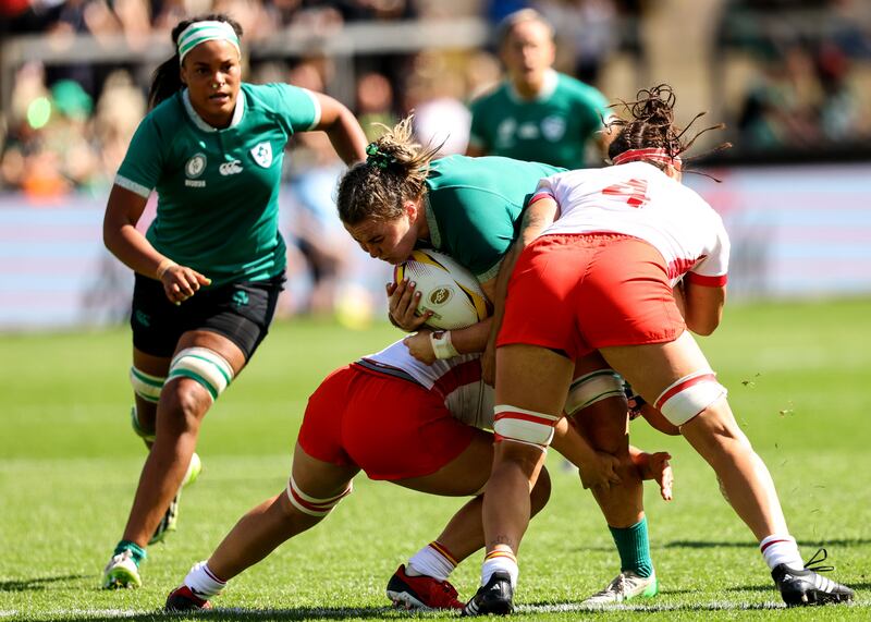Ireland's Fiona Tuite powers through against Spain in Ireland's second World Cup pool game. Photograph: Ben Brady/Inpho