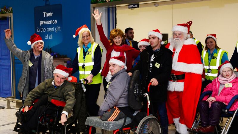 Adi Roche of Chernobyl Children International is pictured with some of the young people who arrived from Belarus for a Christmas visit to Ireland. Photograph: Cyril Byrne/The Irish Times.