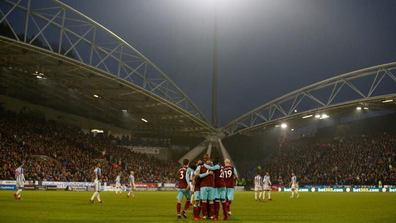 West Ham celebrate their third goal at the John Smith’s Stadium. Photograph: Andrew Yates/Reuters