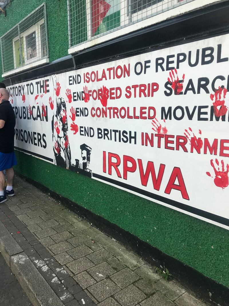 The red handprints placed on the office walls as a protest against the death of Lyra McKee. Photograph: Cate McCurry/PA Wire