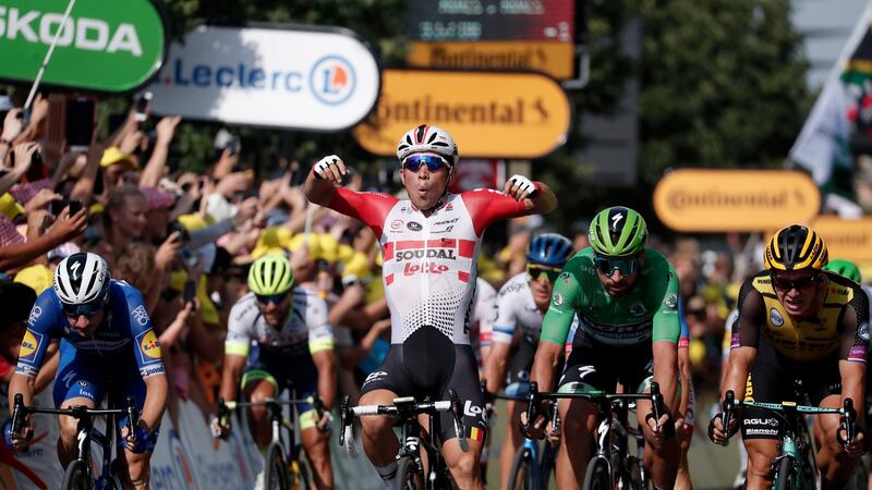 Caleb Ewan of Lotto Soudal celebrates crossing the line in first. Photo: Guillaume Horcajuelo/EPA