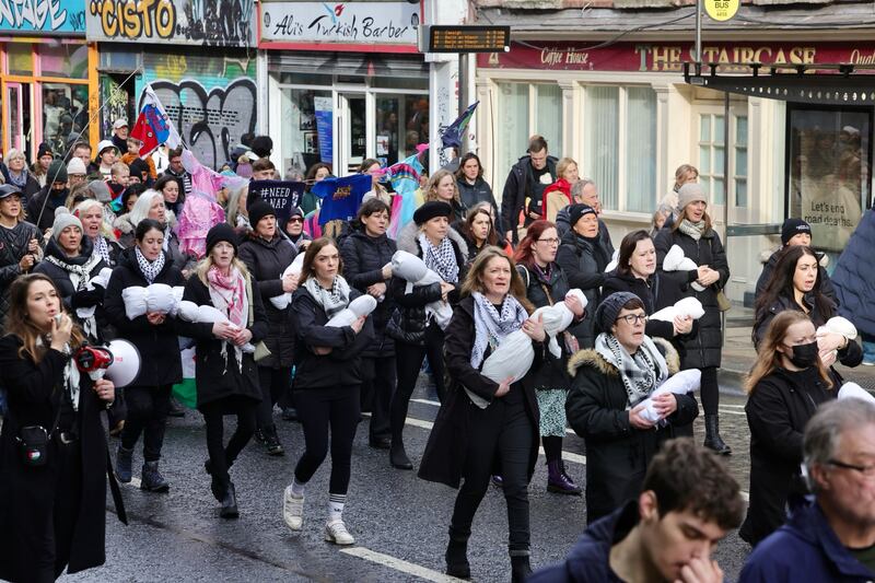 Protesters carry bundles symbolising babies killed in the Israeli invasion of Gaza. Photo: Alan Betson /The  Irish Times
