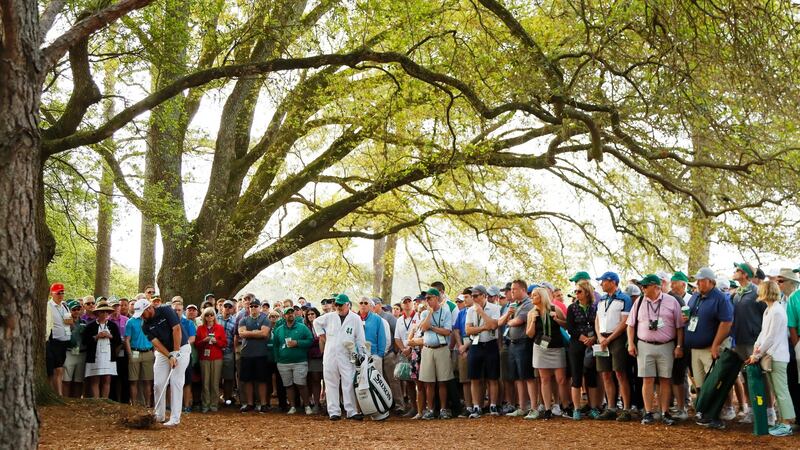 Shane Lowry plays his second shot on his opening hole at Augusta. Photograph: Kevin C Cox/Getty