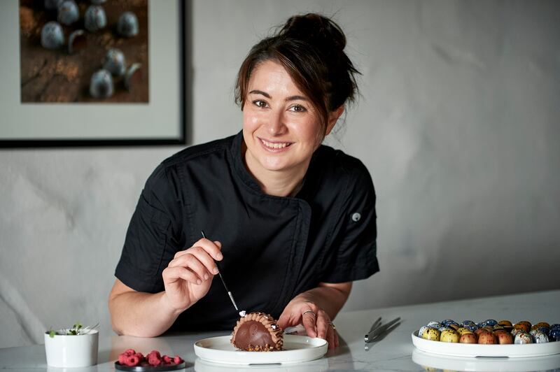 Restaurant manager Clíona Walker samples one of the signature desserts made at The Stonehouse. Photograph: Bríd Ní Luasaigh