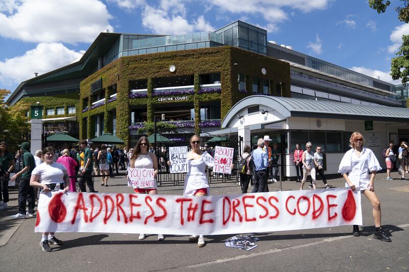 Campaigners from Address The Dress Code outside the main gate at Wimbledon protest over its all white dress code while women are on their period. Photograph: Kirsty O'Connor/PA