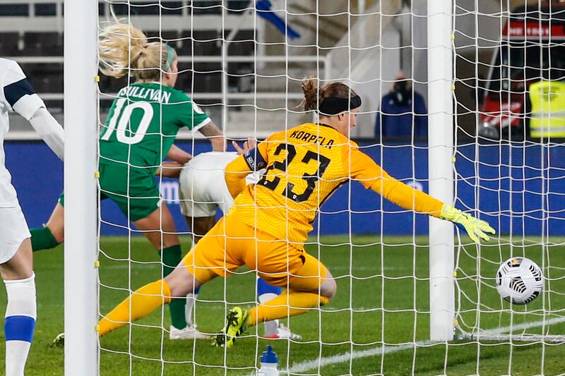 Ireland's Denise O'Sullivan's scores the winner in a 2-1 victory as her header beats Finland goalkeeper Tinja-Riikka Korpela during the qualifier in Helsinki. Photograph: Kalle Parkkinen/Inpho of Finland 

