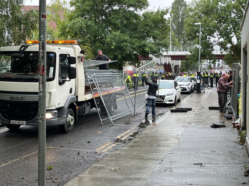 A large Garda presence on the Grand Canal near  Charlemont Luas Station where a number of tents were removed from a grassy area.  Photo: Bryan O’Brien 