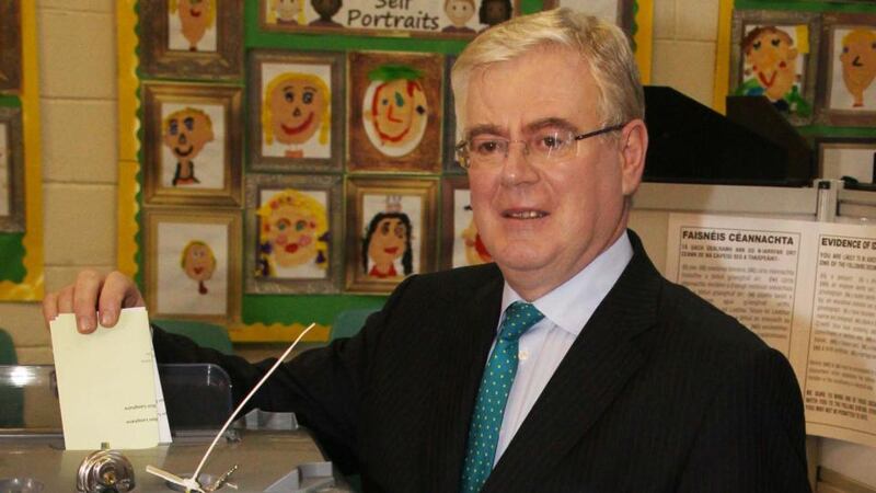 Tanaiste Eamon Gilmore votes at Scoil Mhuire in Shankill, Co Dublin this morning. Photograph: Stephen Collins /Collins Photos