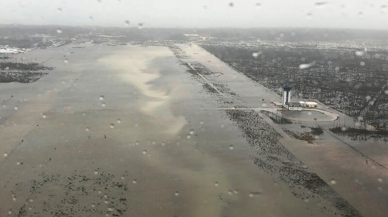 Flooding on the runway of the Marsh Harbour Airport in the Bahamas. Photograph:  US Coast Guard Station Clearwater via AP