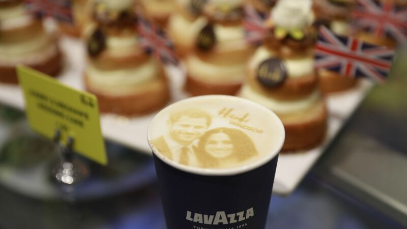 A picture shows a ‘Megharryccino’, a Royal Wedding-themed coffee decorated with the faces of Britain’s Prince Harryand Meghan Markle, in a coffee shop in Windsor. Photograph: Andersen Odd/AFP/Getty Images