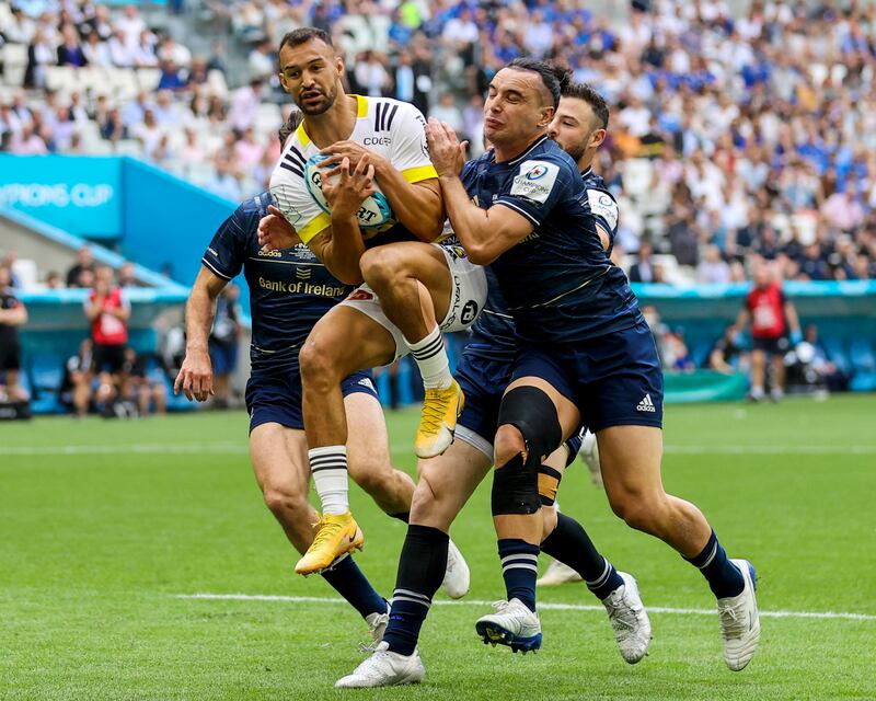 La Rochelle's Dillyn Leyds catches the ball as he is challenged by Leinster's James Lowe during last season's Heineken Champions Cup final at Stade Velodrome in Marseille. Photograph: James Crombie/Inpho