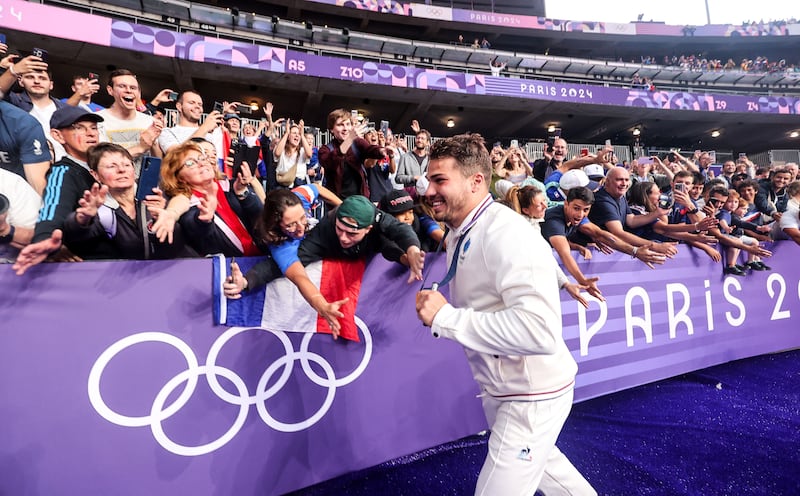 France’s Antoine Dupont celebrates with his gold medal. Photograph: Dan Sheridan