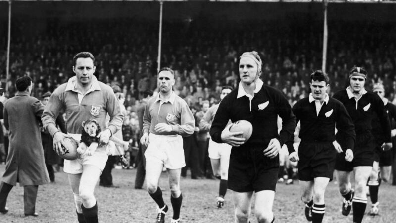 British Lions captain Ronnie Dawson  and All Blacks captain Wilson Whineray lead out their teams before the start of the first Test at  at Dunedin, New Zealand in July 1959.  Dawson carries a lion mascot. (Photograph:  Central Press/Hulton Archive/Getty Images)
