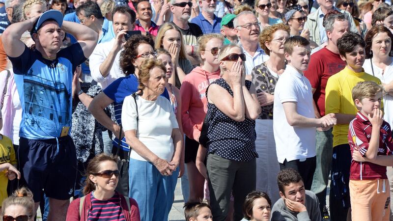 Supporters of Irish boxer Katie Taylor watch her Rio Olympic defeat to Finland’s Mira Potkonen on a big screen erected at the seafront in  her home town of Bray, Co Wicklow. Photograph: Eric Luke/The Irish Times.