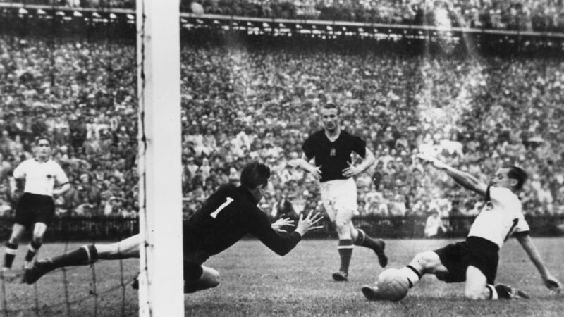 West Germany’s Max Morlock makes it 2-1 against Hungary. Photograph: Keystone/Getty