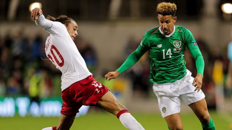 Ireland’s Callum Robinson goes past  Yussuf Poulsen of Denmark during the   Nations League game at the  Aviva Stadium. Photograph: Laszlo Geczo/Inpho