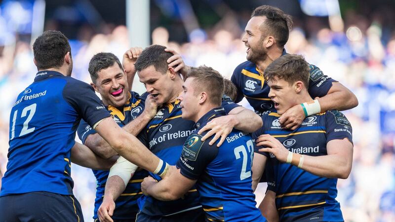 Leinster players celebrate Jonathan Sexton’s try against Scarlets at the Aviva Stadium. Photograph:  Morgan Treacy/Inpho